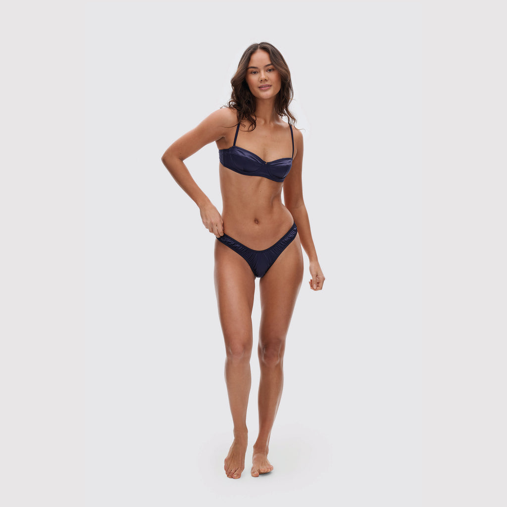 Navy satin balconette bra on model, full body view