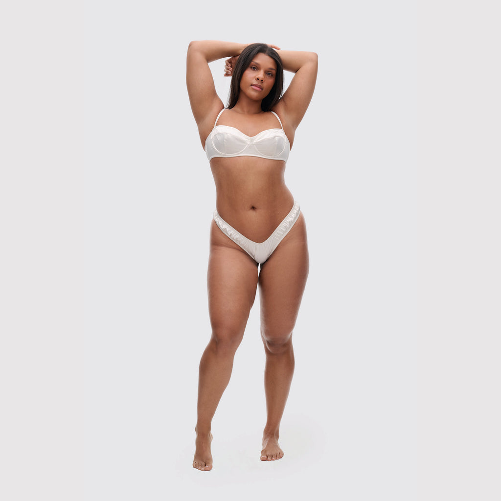 Ivory satin balconette bra on model, full body view